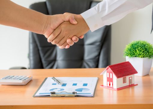 hands-agent-client-shaking-hands-after-signed-contract-buy-new-apartment